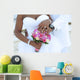 Black couple, hands and flowers Wall Mural