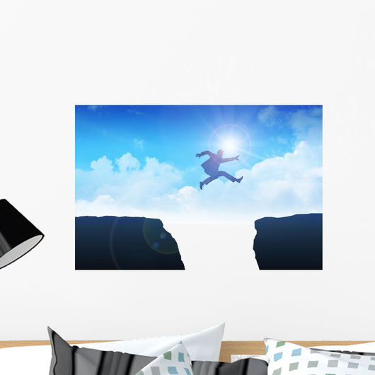 Man jumping over the ravine Wall Mural
