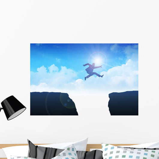 Man jumping over the ravine Wall Mural