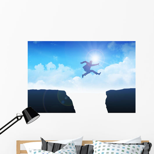 Man jumping over the ravine Wall Mural