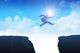 Man Jumping Over The Ravine Wall Decal