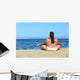 overweight woman meditation on beach Wall Mural
