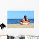 overweight woman meditation on beach Wall Mural