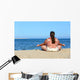 overweight woman meditation on beach Wall Mural
