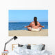 overweight woman meditation on beach Wall Mural