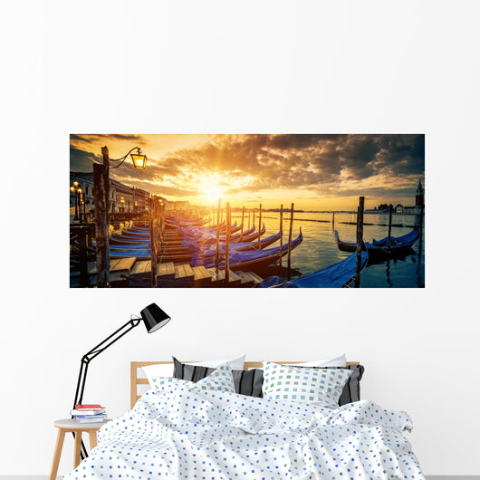 Panoramic view of Venice with gondolas at sunrise Wall Mural
