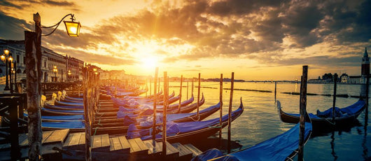 Panoramic view of Venice with gondolas at sunrise Wall Mural