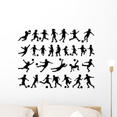 Children Playing Soccer Vector Wall Stickers shown on a wall