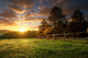 Picturesque landscape, fenced ranch at sunrise Wall Mural