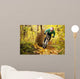 Mountainbiker Rides Autumn Forest