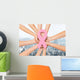 close up of hands with cancer awareness symbol Wall Mural