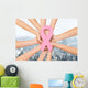 close up of hands with cancer awareness symbol Wall Mural