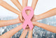 close up of hands with cancer awareness symbol Wall Mural