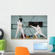 Little girl fencer and her trainer Wall Mural