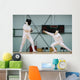 Little girl fencer and her trainer Wall Mural