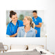 nurse talking to senior woman Wall Mural