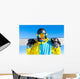 Snowboarder holding snowboard Wall Mural