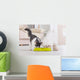 Dog and cat eating food from a bowl Wall Mural