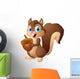 Carton squirrel holding acorn Wall Decal