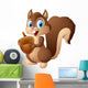 Carton squirrel holding acorn Wall Decal