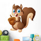 Carton squirrel holding acorn Wall Decal