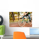 Man on bike Wall Mural