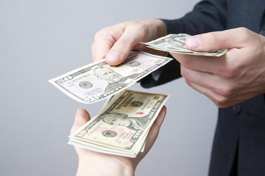 Money in the hands of the people Wall Mural