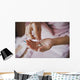 Earrings from pearls in hands 1278. Wall Mural
