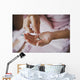 Earrings from pearls in hands 1278. Wall Mural