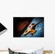 Muscular man practicing rock-climbing on a rock wall indoors Wall Mural