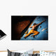 Muscular man practicing rock-climbing on a rock wall indoors Wall Mural