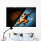 Muscular man practicing rock-climbing on a rock wall indoors Wall Mural