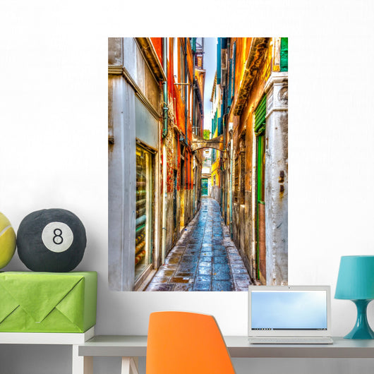 Narrow stone made street at Venice Italy. HDR processed Wall Mural