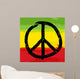 Peace symbol and rastafarian colors in background, vector Wall Mural
