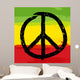 Peace symbol and rastafarian colors in background, vector Wall Mural