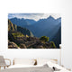 Rays of light on Machu Picchu ruins Wall Mural