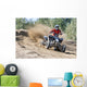 Rider driving in the quadbike race Wall Mural