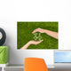 Open hands making a protection gesture Wall Mural