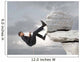 Young businessman scaling a rock Wall Mural