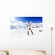 Skiing , mountains and ski equipments on ski run Wall Mural