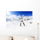 Skiing , mountains and ski equipments on ski run Wall Mural