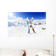 Skiing , mountains and ski equipments on ski run Wall Mural