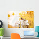 Senior couple with bicycle in autumn park Wall Mural