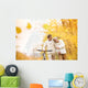 Senior couple with bicycle in autumn park Wall Mural