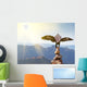 Wedge-tailed Eagle landing on rock cairn on mountain top Wall Mural