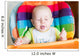 Adorable baby eating in high chair Wall Mural