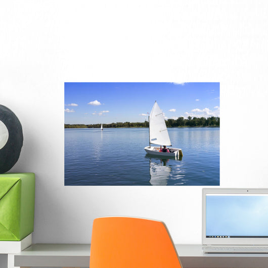 White boat sailing Wall Mural