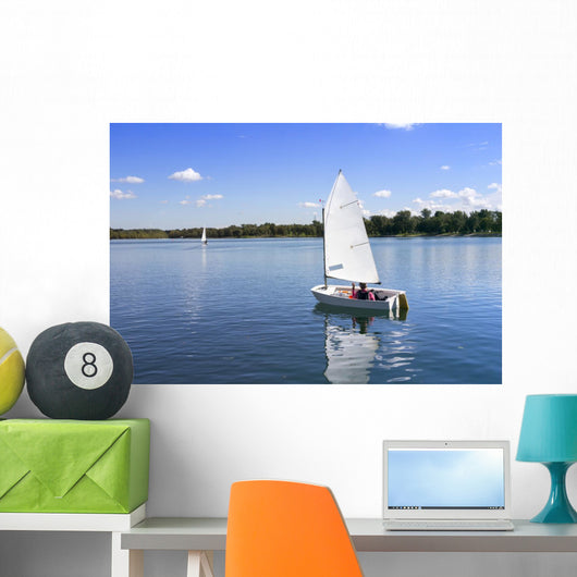 White boat sailing Wall Mural