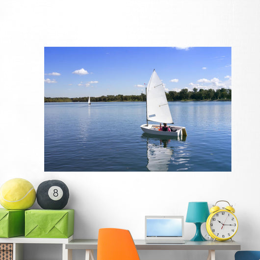 White boat sailing Wall Mural