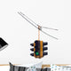 Green traffic light hanging from a cable, isolated on white. Wall Decal